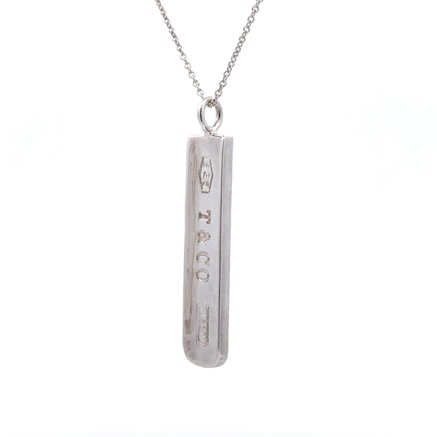 Elsa Peretti® Alphabet Letter T Pendant in Silver, Small | Tiffany & Co.